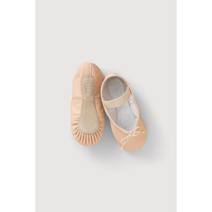 A pair of baby ballet flats in a light peach-beige color, shown from top and side angles on a light gray background.