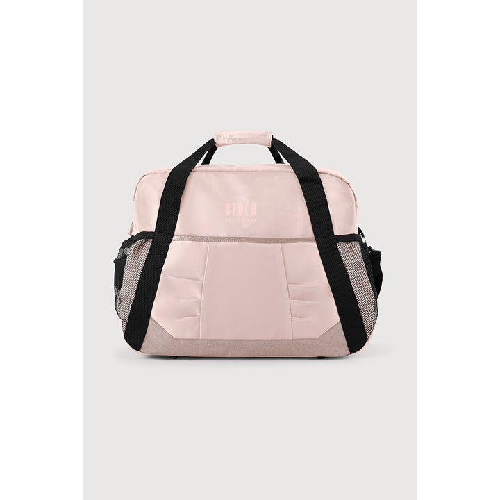 A light Shell pink and gray travel duffel bag with black handles and side mesh pockets, shown against a neutral light gray background.
