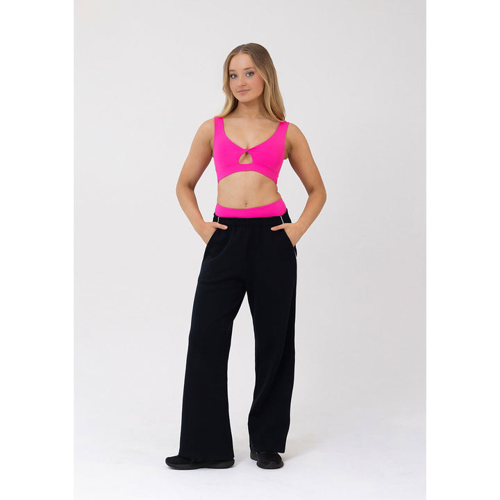 Studio 7 Dancewear Renee Crop Top woman wearing Hot Pink