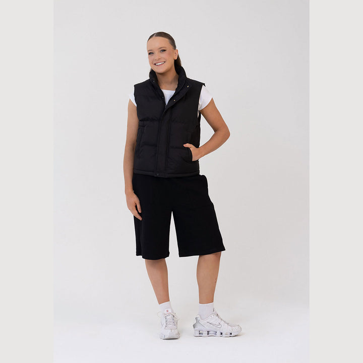 Studio 7 Dancewear Studio Puffer Vest woman wearing, front view